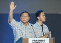 Pengamat memperkirakan ekonomi Indonesia mampu tumbuh di kisaran 5 persen di bawah Prabowo Subianto-Gibran Rakabuming yang melanjutkan kebijakan Jokowi. (AP/Vincent Thian).