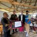 Penyerahan secara simbolis bantuan paket antropometri kit kepada Tenaga Kesehatan di Desa Wae Ajang, Kabupaten Manggarai.